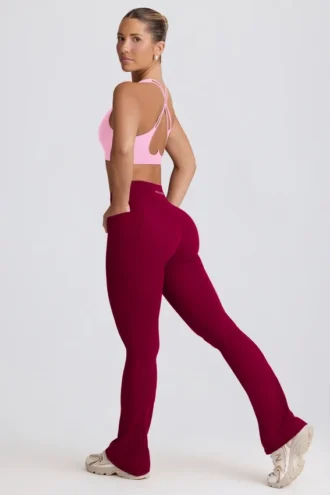Leggings Soft Active à taille en V et poches, jambes évasées, couleur bordeaux