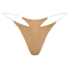 Lingerie String en maille sans coutures à bretelles transparentes, couleur caramel Lingerie String en maille sans coutures à bretelles transparentes, couleur caramel