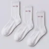 Lot de 3 paires de chaussettes mi-longues côtelées, blanc et rose Lot de 3 paires de chaussettes mi-longues côtelées, blanc et rose