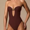 Maillot de bain 1 pièce bandeau à découpes Faye, couleur brun espresso Maillot de bain 1 pièce bandeau à découpes Faye, couleur brun espresso