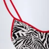 Maillot de bain 1 pièce dos croisé Ostend à détails charmants, imprimé zèbre Maillot de bain 1 pièce dos croisé Ostend à détails charmants, imprimé zèbre