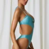 Maillot de bain 1 pièce dos nu à découpes et détails perles Melo Melo, couleur turquoise Maillot de bain 1 pièce dos nu à découpes et détails perles Melo Melo, couleur turquoise