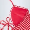 Maillot de bain 1 pièce dos nu à volants et découpes Montjoi en vichy rouge Maillot de bain 1 pièce dos nu à volants et découpes Montjoi en vichy rouge