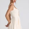 Micro-mini-robe trapèze à nœud Nanisca, couleur ivoire