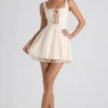 Micro-mini-robe trapèze à nœud Nanisca, couleur ivoire
