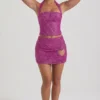 Mini-jupe A-line à détails en forme de cœur brodés Querida, couleur magenta