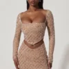 Mini-jupe asymétrique à taille mi-haute Veah, ornée, couleur amande Mini-jupe asymétrique à taille mi-haute Veah, ornée, couleur amande