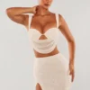 Mini-jupe Belle Ile à taille haute et fente sur la cuisse, en blanc Mini-jupe Belle Ile à taille haute et fente sur la cuisse, en blanc