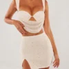 Mini-jupe Belle Ile à taille haute et fente sur la cuisse, en blanc Mini-jupe Belle Ile à taille haute et fente sur la cuisse, en blanc