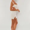 Mini-jupe Belle Ile à taille haute et fente sur la cuisse, en blanc Mini-jupe Belle Ile à taille haute et fente sur la cuisse, en blanc