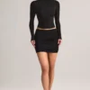 Mini-jupe Cali en modal froncé à taille mi-haute, en noir Mini-jupe Cali en modal froncé à taille mi-haute, en noir