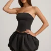 Mini-jupe Clemmy à ourlet bouffant et taille mi-haute, en noir Mini-jupe Clemmy à ourlet bouffant et taille mi-haute, en noir