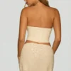 Mini-jupe drapée à taille mi-haute et ornée Sybil en blanc Mini-jupe drapée à taille mi-haute et ornée Sybil en blanc