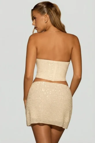 Mini-jupe drapée à taille mi-haute et ornée Sybil en blanc