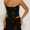 Mini-jupe drapée à taille mi-haute et ornée Sybil, en noir