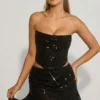 Mini-jupe drapée à taille mi-haute et ornée Sybil, en noir