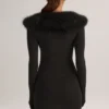 Mini-jupe en maille Tova à taille mi-haute, couleur noire Mini-jupe en maille Tova à taille mi-haute, couleur noire