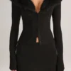Mini-jupe en maille Tova à taille mi-haute, couleur noire Mini-jupe en maille Tova à taille mi-haute, couleur noire