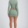 Mini-jupe froncée à taille mi-haute en modal Cali, vert sauge