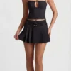 Mini-jupe plissée à taille basse et ceinture Velora, en noir Mini-jupe plissée à taille basse et ceinture Velora, en noir