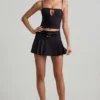 Mini-jupe plissée à taille basse et ceinture Velora, en noir Mini-jupe plissée à taille basse et ceinture Velora, en noir