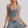 Mini-jupe plissée taille basse Laika en bleu clair Mini-jupe plissée taille basse Laika en bleu clair