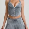 Mini-jupe plissée taille basse Laika en bleu clair Mini-jupe plissée taille basse Laika en bleu clair