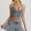 Mini-jupe plissée taille basse Laika en bleu clair Mini-jupe plissée taille basse Laika en bleu clair