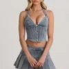 Mini-jupe plissée taille basse Laika en bleu clair Mini-jupe plissée taille basse Laika en bleu clair