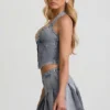 Mini-jupe plissée taille basse Laika en bleu clair Mini-jupe plissée taille basse Laika en bleu clair