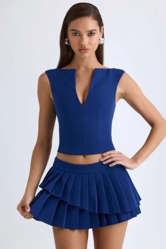 Mini-jupe plissée à volants et taille basse Nada, couleur bleu marine