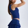 Mini-jupe plissée à volants et taille basse Nada, couleur bleu marine Mini-jupe plissée à volants et taille basse Nada, couleur bleu marine