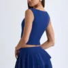 Mini-jupe plissée à volants et taille basse Nada, couleur bleu marine Mini-jupe plissée à volants et taille basse Nada, couleur bleu marine