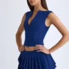 Mini-jupe plissée à volants et taille basse Nada, couleur bleu marine Mini-jupe plissée à volants et taille basse Nada, couleur bleu marine