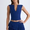 Mini-jupe plissée à volants et taille basse Nada, couleur bleu marine Mini-jupe plissée à volants et taille basse Nada, couleur bleu marine