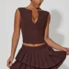 Mini-jupe plissée à volants et taille basse Nada, couleur chocolat Mini-jupe plissée à volants et taille basse Nada, couleur chocolat