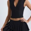 Mini-jupe plissée à volants et taille basse Nada, en noir