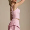 Mini-jupe plissée à volants et taille basse Nada, rose pâle