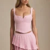 Mini-jupe plissée à volants et taille basse Nada, rose pâle