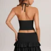 Mini-jupe-short Azaria en modal à volants et taille mi-haute, en noir Mini-jupe-short Azaria en modal à volants et taille mi-haute, en noir