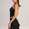 Mini-jupe-short Azaria en modal à volants et taille mi-haute, en noir Mini-jupe-short Azaria en modal à volants et taille mi-haute, en noir