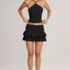 Mini-jupe-short Azaria en modal à volants et taille mi-haute, en noir Mini-jupe-short Azaria en modal à volants et taille mi-haute, en noir