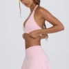 Mini-jupe-short croisée en jersey brossé, couleur rose pâle chiné Mini-jupe-short croisée en jersey brossé, couleur rose pâle chiné