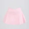 Mini-jupe-short croisée en jersey brossé, couleur rose pâle chiné Mini-jupe-short croisée en jersey brossé, couleur rose pâle chiné
