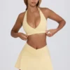 Mini-jupe-short croisée en jersey brossé marbré citron
