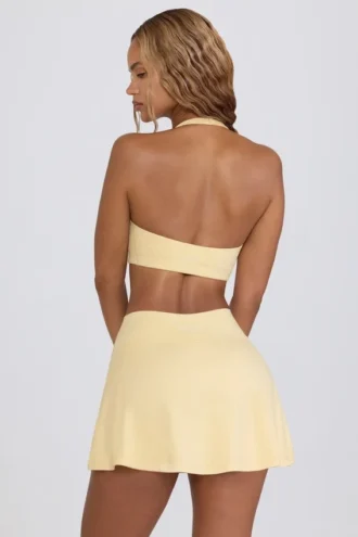 Mini-jupe-short croisée en jersey brossé marbré citron