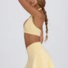 Mini-jupe-short croisée en jersey brossé marbré citron