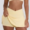 Mini-jupe-short croisée en jersey brossé marbré citron