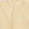 Mini-jupe-short croisée en jersey brossé marbré citron