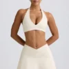 Mini-jupe-short croisée en jersey brossé marbré ivoire Mini-jupe-short croisée en jersey brossé marbré ivoire